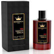 A bottle of Milestone Monarch Red Tobacco Vanilla Eau De Parfum, 100ml, from Rio Perfumes, sits elegantly beside its black packaging box, exuding an enchanting fragrance.