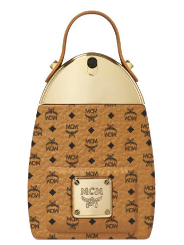 MCM handbag featuring a tan monogrammed pattern, gold handle, and front metal plate logo pairs elegantly with MCM Eau de Parfum 75ml for a cohesive style.