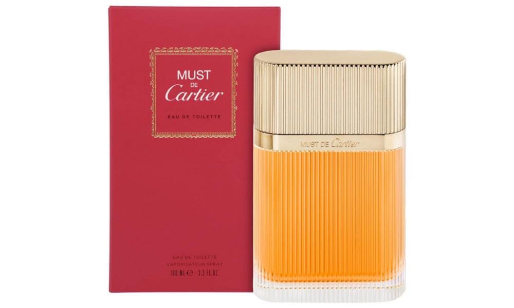 The vendor-unknown Cartier MUST DE Cartier 50ml Eau De Toilette boasts a captivating fragrance for women, elegantly presented in a red and gold bottle beside its matching red box.