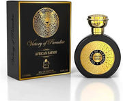 A black and gold bottle of "Milestone Victory of Paradise African Safari 100ml Eau De Parfum" by Milestone Perfumes is shown next to its matching, ornate box featuring a leopard design. This unisex fragrance contains 100ml (3.4 fl oz) of exotic allure.