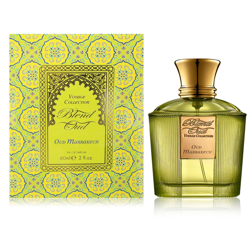 Load image into Gallery viewer, The 60ml Eau de Parfum bottle from the Blend Oud Voyage Collection, named &quot;Oud Marrakech,&quot; sits gracefully next to a patterned yellow and green box, showcasing Rio Perfumes&#39; sophisticated branding for this unisex fragrance.
