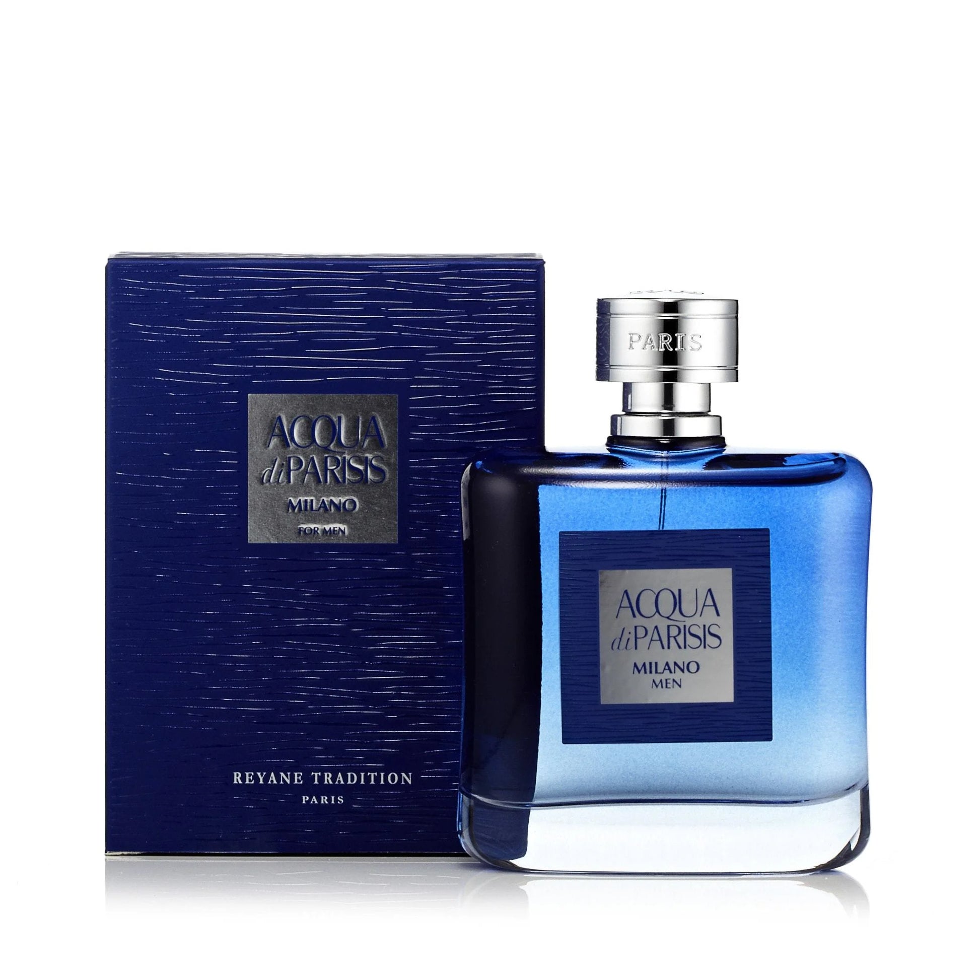 A bottle of Reyane Tradition Acqua Di Parisis Milan 100ml EDT, with its striking blue color and stylish silver and blue-accented packaging, is displayed beside its box. This captivating scent for men by Reyane Tradition embodies sophistication and elegance.