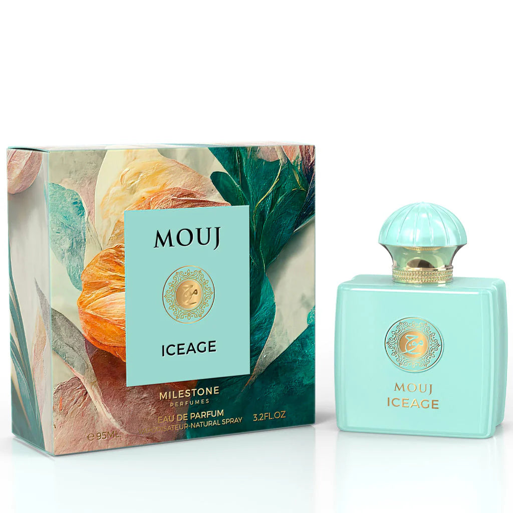 A box and bottle of Rio Perfumes' Milestone Mouge Ice Age 95ml Eau De Parfum are displayed. The box features a floral design, while the turquoise bottle with a gold emblem and rounded cap makes this fragrance for men and women truly captivating.