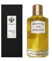 Image of a Mancera Fabulous Yuzu Eau De Parfum bottle next to its matching black and gold box packaging. The bottle contains yellow liquid, and the box displays the same product name and logo, epitomizing a sophisticated fragrance experience.