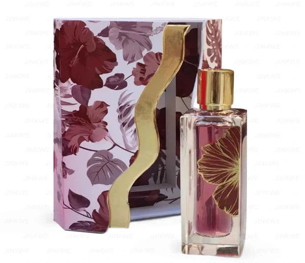 The Paris Corner Ibisco Nirvana 65ml Extrait De Parfum showcases a floral-designed bottle, complemented by a matching gold-accented box. This exquisite unisex fragrance is crafted by the renowned Paris Corner.