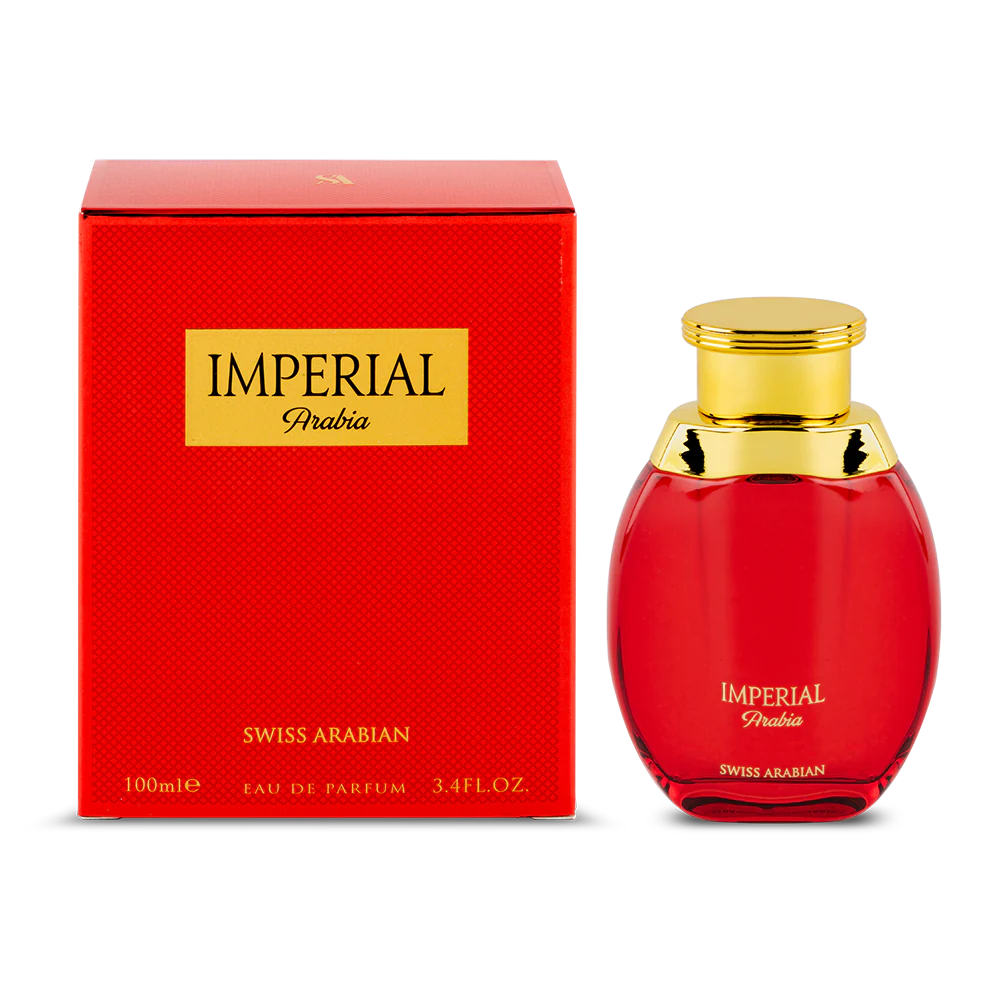 A red rectangular box labeled "Swiss Arabian Imperial Arabia" and a red perfume bottle with a gold cap, also labeled "Swiss Arabian Imperial Arabia." This unisex fragrance, offered by Swiss Arabian, contains 100 ml of Eau de Parfum and captures the essence of Swiss Arabian Intense Pride with subtle hints of oud.