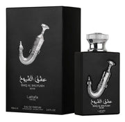 A black box and bottle of Lattafa Ishq Al Shuyukh Silver 100ml Eau De Parfum showcase an oriental fragrance, elegantly adorned with an intricate silver dagger design.