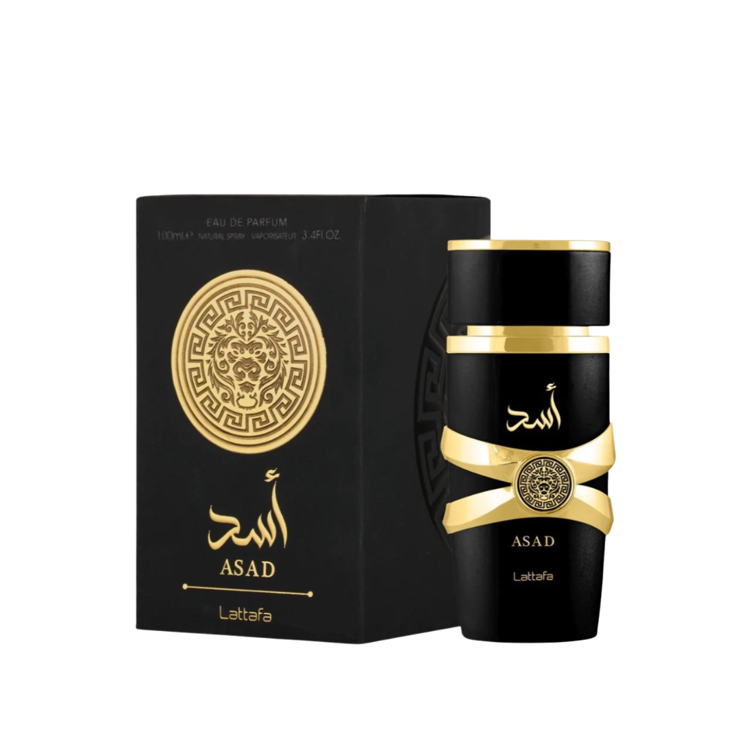 The Lattafa Asad 100ml Eau de Parfum comes in an elegant black and gold bottle and box, featuring intricate Arabic script and design, exuding luxury and sophistication.