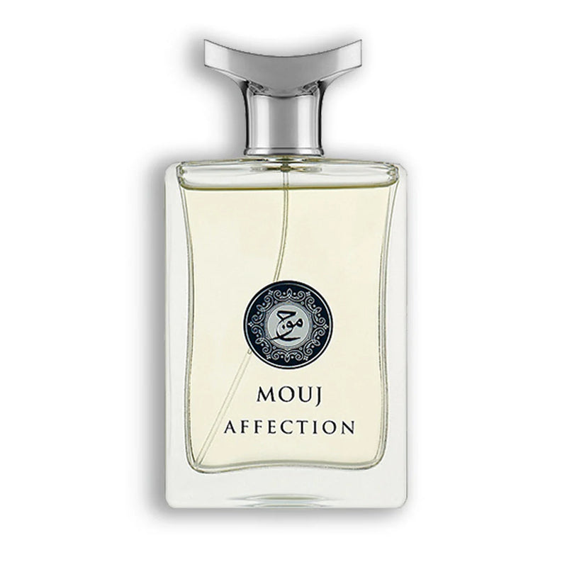 Load image into Gallery viewer, A clear glass bottle of Milestone Mouj Affection 100ml Eau De Parfum by Milestone Perfumes, adorned with a silver cap and filled with light yellow liquid. The men&#39;s fragrance boasts a decorative black circular emblem and elegant text.
