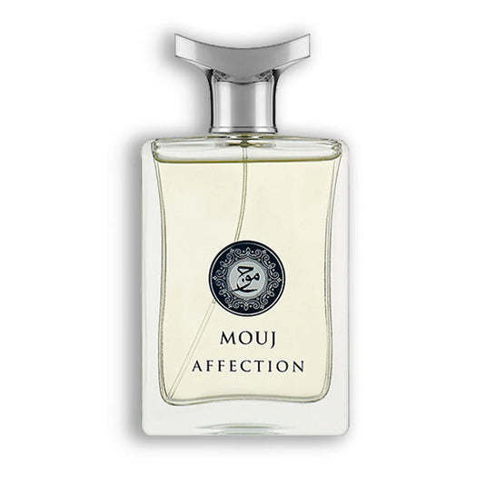 A clear glass bottle of Milestone Mouj Affection 100ml Eau De Parfum by Milestone Perfumes, adorned with a silver cap and filled with light yellow liquid. The men's fragrance boasts a decorative black circular emblem and elegant text.