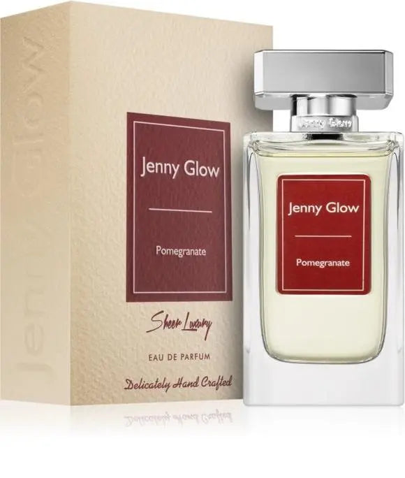 A bottle of Jenny Glow Pomegranate 80ml Eau De Parfum, a unisex Eau de Parfum, next to its packaging box.