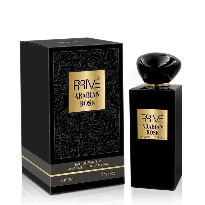 A black rectangular perfume bottle labeled "Emper Arabian Rose Prive 100ml Eau De Parfum" sits elegantly beside its matching box adorned with rose patterns.