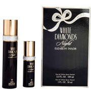 Two "Elizabeth Taylor White Diamonds Night" Eau De Toilette bottles (100ml and 30ml) featuring a Floral Woody Musk scent are stylishly displayed next to their black packaging with a decorative bow design.