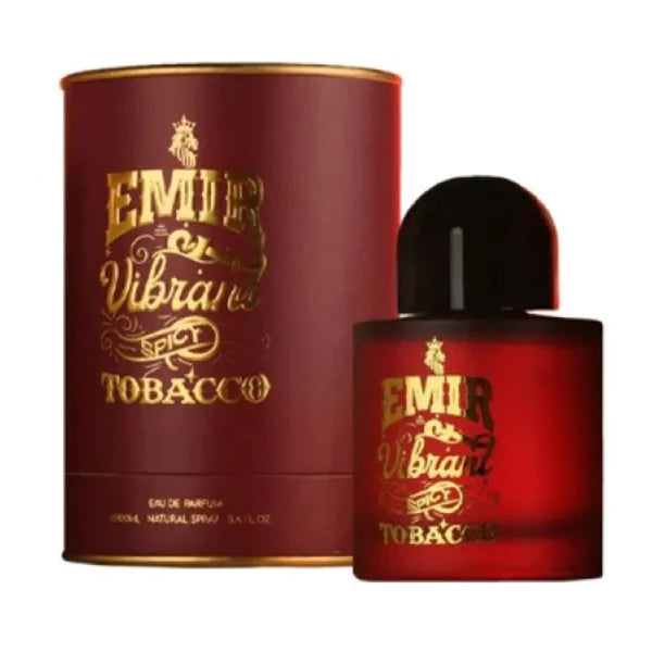 The Paris Corner Emir Vibrant Spicy Tobacco 100ml Eau De Parfum is elegantly encased in red and gold packaging that captivates the senses. With its cylindrical box and sleek bottle topped by a black cap, this fragrance perfectly embodies a blend of luxury and allure.