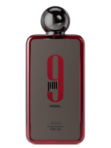 Afnan 9 pm Rebel 100ml Eau De Parfum, with its dark metallic label and spherical cap, offers an aromatic fruity fragrance suitable for men and women.