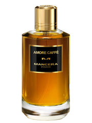 A clear glass bottle containing amber liquid, labeled "Mancera Amore Caffè 120ml Eau De Parfum." It features a gold cylindrical cap and a black rectangular label with gold text. This exquisite creation from Mancera captures the essence of luxurious fragrance in every drop.