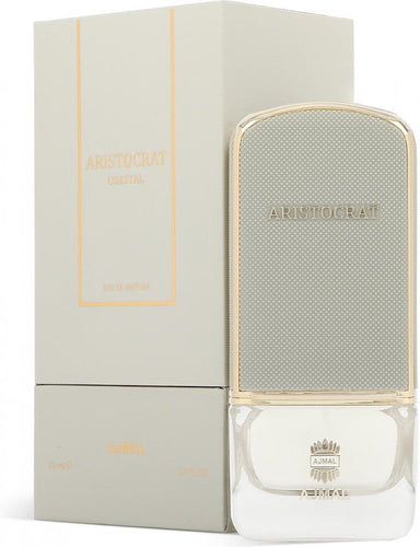 A bottle of Ajmal Aristocrat Coastal 75ml Eau De Parfum from Rio Perfumes is placed in front of its beige packaging box, which also features the same branding.