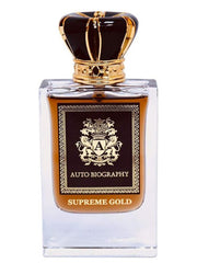 A clear glass perfume bottle with a gold and black cap. The label reads "Autobiography Supreme Gold 50ml Eau De Parfum" and features a crest with the letter "A" in the center. This Autobiography unisex Eau De Parfum boasts a woody spicy fragrance that captivates with its elegance and sophistication.