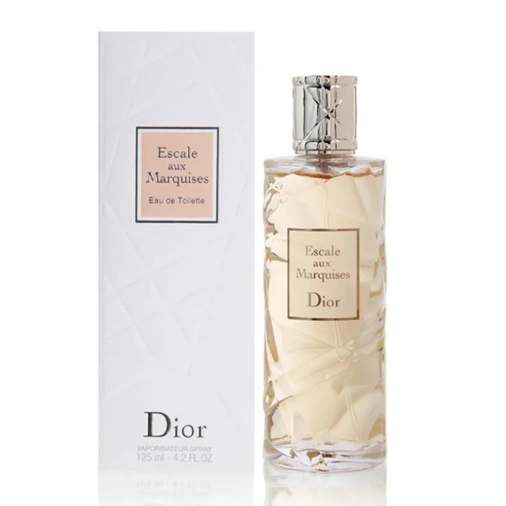 The Dior Escale aux Marquises 125ml Eau De Toilette bottle sits gracefully next to its coordinating white packaging, releasing a refreshing scent that evokes the enchanting essence associated with Dior Addict to Life.