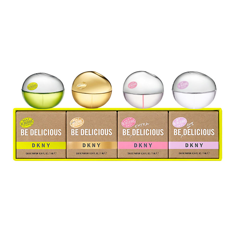 A row of four vibrant DKNY Be Delicious Eau de Parfum bottles, paired with matching boxes, is presented as an appealing Perfume Gift Set under the product name "DKNY Be Delicious Eau de Parfum Mini Set" by DKNY.