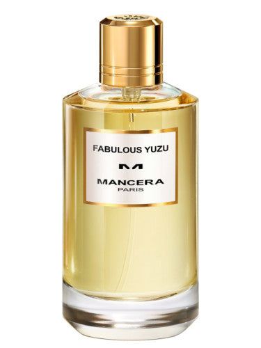 A 120ml glass bottle of Mancera Fabulous Yuzu Eau De Parfum by Mancera, labelled "Fabulous Yuzu" and topped with a golden cap, is filled with a yellow liquid.