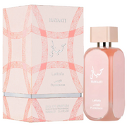 A bottle of Lataffa Hayaati Florence 100ml Eau De Parfum next to its packaging, featuring elegant Arabic script and geometric patterns in pink and white.