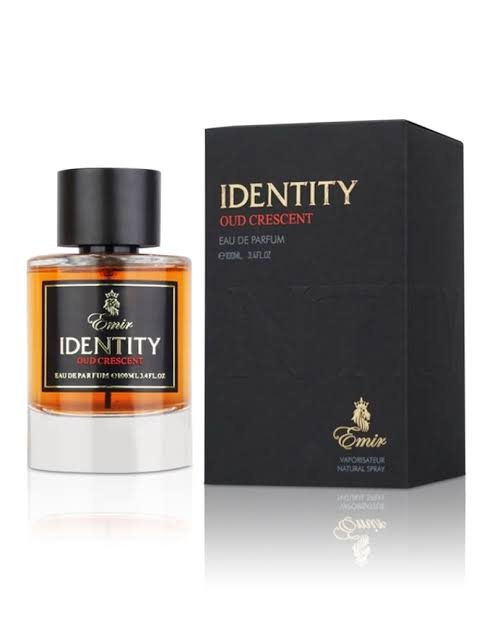 A bottle of Paris Corner Emir Identity Oud Crescent 100ml Eau De Parfum with a box next to it.