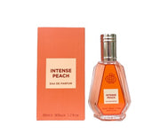 A rectangular box labeled "Fragrance World Intense Peach 50ml Eau De Parfum" from Rio Perfumes is positioned next to a faceted glass bottle featuring a silver cap, filled with 50ml of peach-colored unisex fragrance.