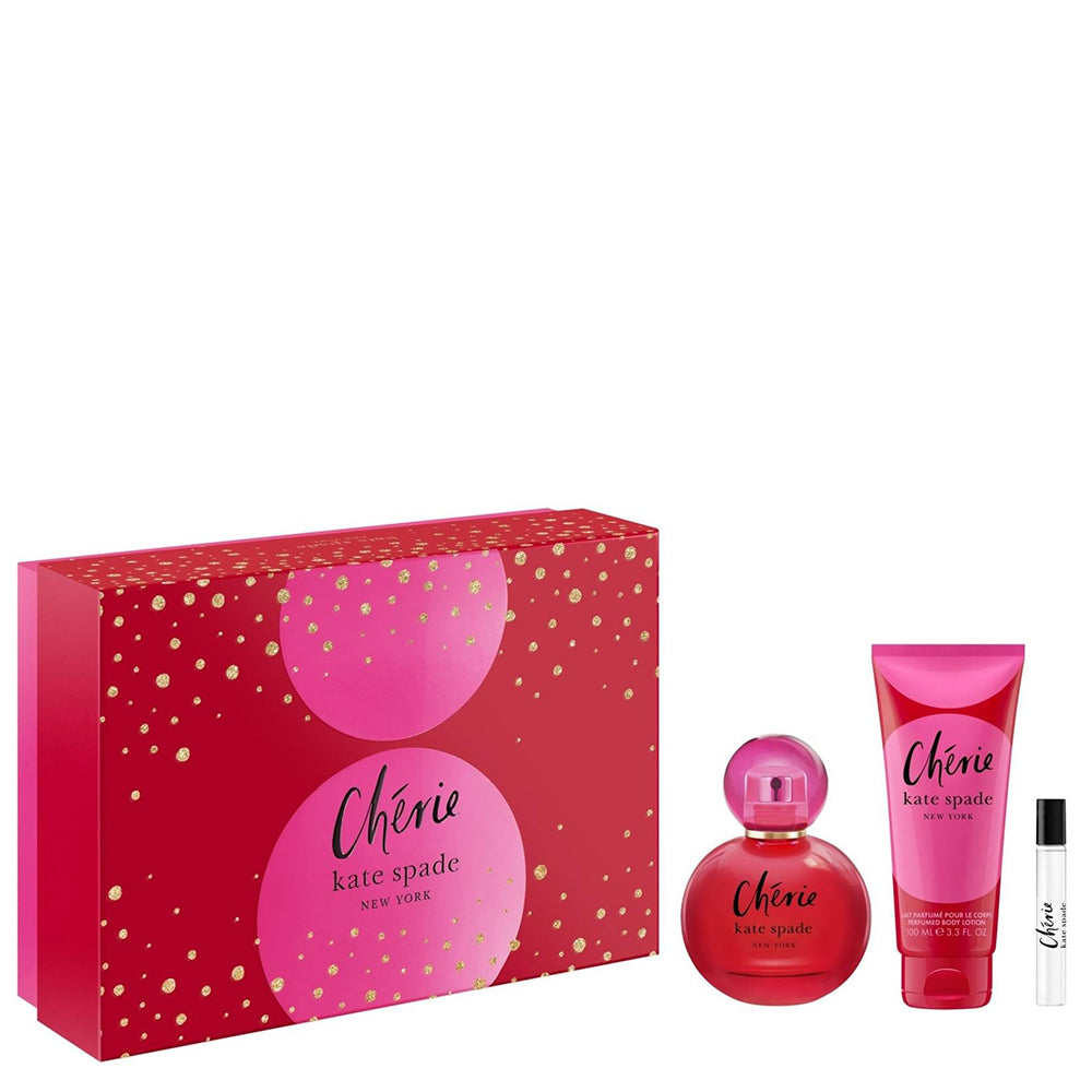 The Kate Spade New York Cherie 100ml Eau De Parfum Gift Set includes an Eau De Parfum in a red bottle, a pink tube, and a small spray vial. The chic red box with gold dots encapsulates this sophisticated fragrance for women.