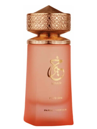 Load image into Gallery viewer, The Paris Corner Khair Fusion 100ml Eau De Parfum, elegantly adorned with an ornate gold cap and Arabic script on a matte peach-colored bottle, offers a captivating fragrance for both men and women.
