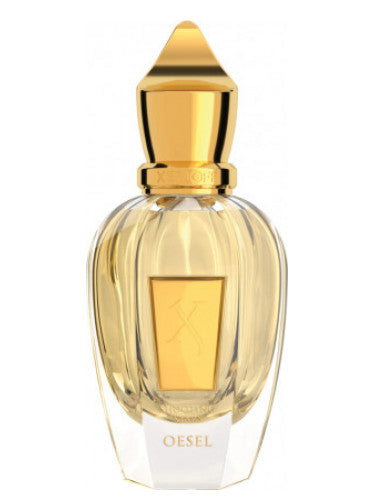 A luxurious Xerjoff Oesel 100ml Eau De Parfum bottle with a gleaming gold lid emitting a captivating fragrance.