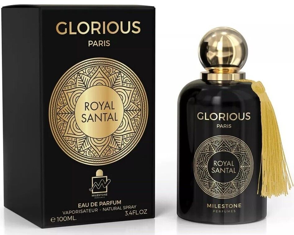 The "Milestone Glorious Paris Royal Santal" Eau De Parfum, embellished with a tassel, sits elegantly next to its black and gold box, emanating an enticing fragrance that enhances its luxurious design.