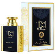 A bottle of Lattafa Rouat Ajial 100ml Eau de Parfum next to its box, featuring elegant gold and black designs by Lattafa.