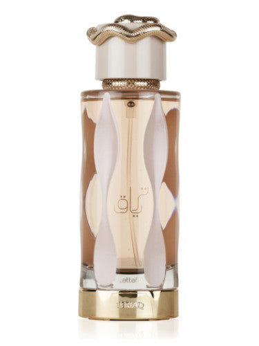 The Lattafa Teriaq 100ml Eau De Parfum, offered by Rio Perfumes, features a gold cap and a wavy design on its transparent glass body adorned with elegant Arabic script, delivering an exquisite fragrance experience.