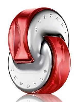 The Bvlgari Omnia Coral 65ml EDT, designed by Alberto Morillas, is a floral-fruity perfume in a red and silver interlocking ring-shaped bottle with "Bvlgari" embossed on its surface.