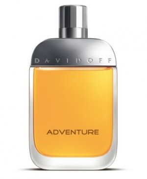 The Davidoff Adventure 50ml EDT Gift Set for men showcases a sleek silver cap and vibrant orange liquid, offering a woody and spicy aroma.