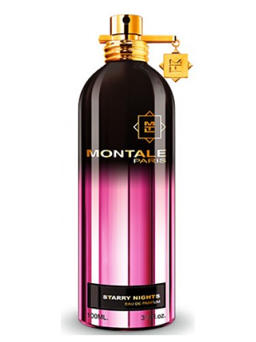 A cylindrical perfume bottle with a gradient of black to pink, labeled "Montale Paris." The tag reads "Montale Paris Starry Nights 100ml Eau De Parfum 3.3FL.OZ." This Amber Floral fragrance bottle features a gold cap and charm.