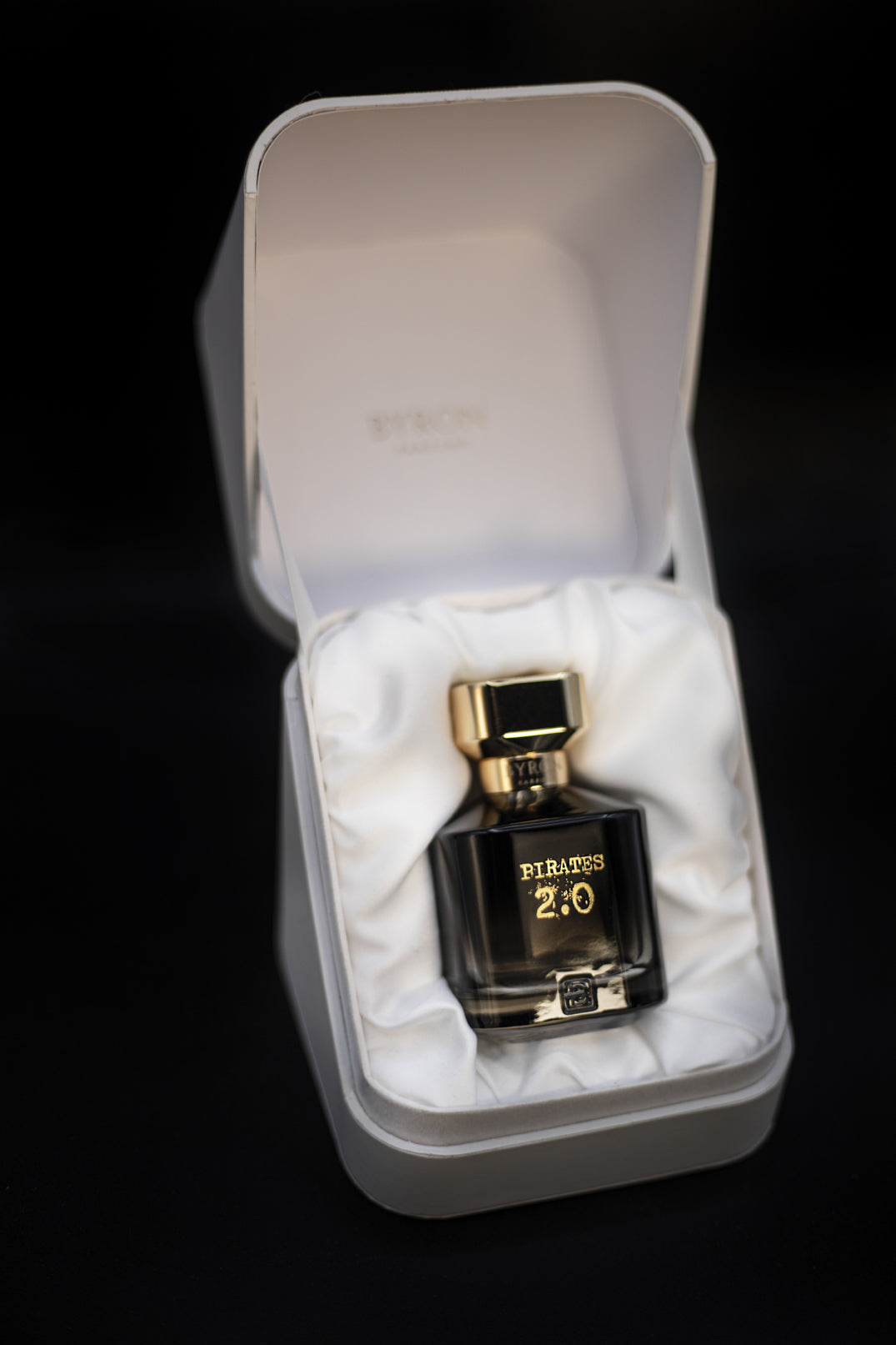 A bottle of Byron Parfums Pirates 2.0 Narcotic Collection 75ml Extrait De Parfum, elegantly presented in a white box.