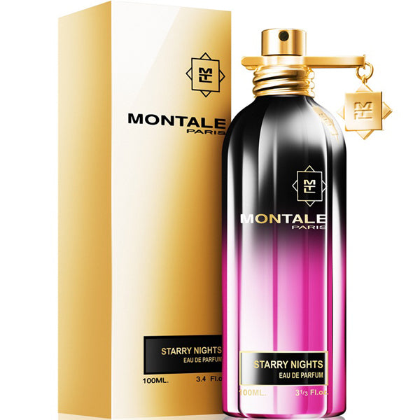 A Montale Paris Starry Nights 100ml Eau De Parfum bottle, featuring a gold and black gradient design that beautifully evokes its Amber Floral fragrance, sits elegantly beside its matching gold and white packaging box.