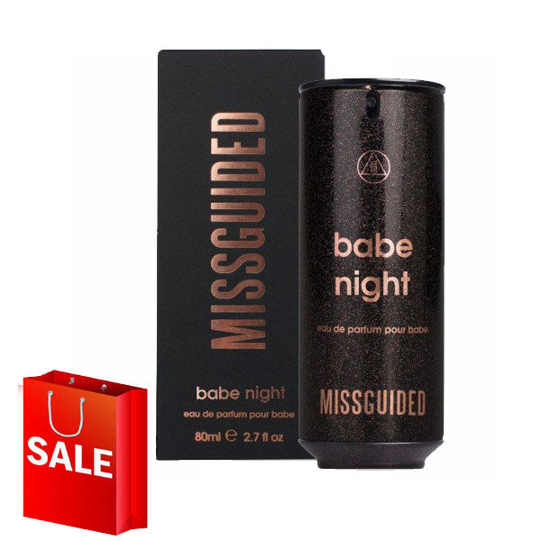 A bottle of Missguided Babe Night 80ml Eau De Parfum with a floral bag.