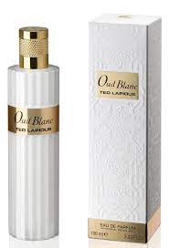 Load image into Gallery viewer, A bottle of Ted Lapidus Oud Blanc 100ml Eau De Parfum next to a box.
